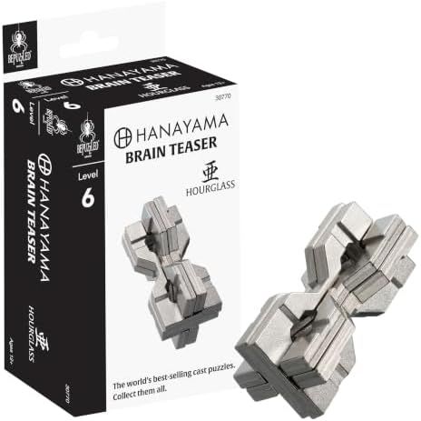 Hourglass hanayama cast metal puzzle assembled on a work bench