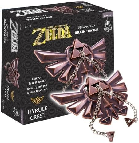 Legend of Zelda Hyrule Crest hanayama cast metal puzzle assembled on a work bench