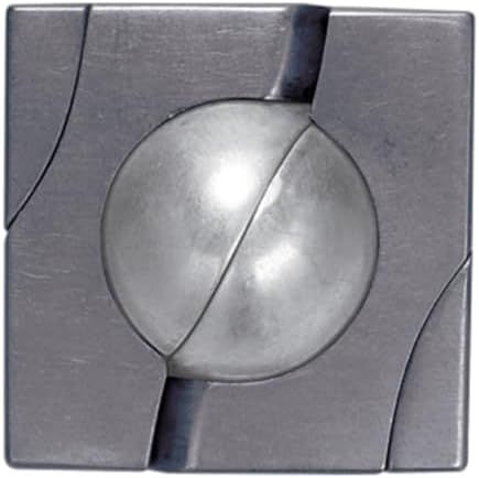 Marble hanayama cast metal puzzle assembled on a work bench
