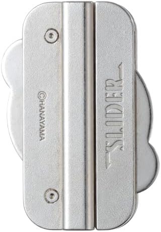 Slider hanayama cast metal puzzle assembled on a work bench